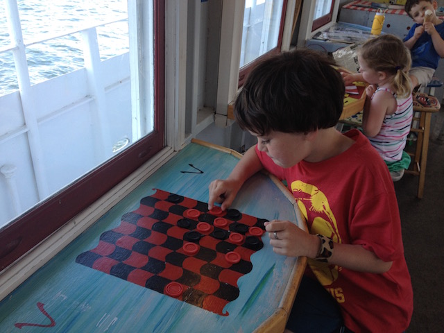 Playing checkers on ice cream cruise