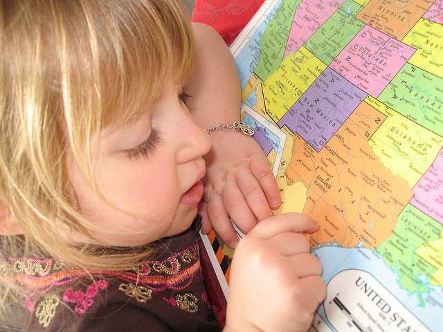 kid and a map 