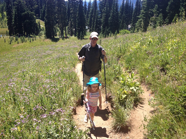 Dad and daughter mountain wildflowers